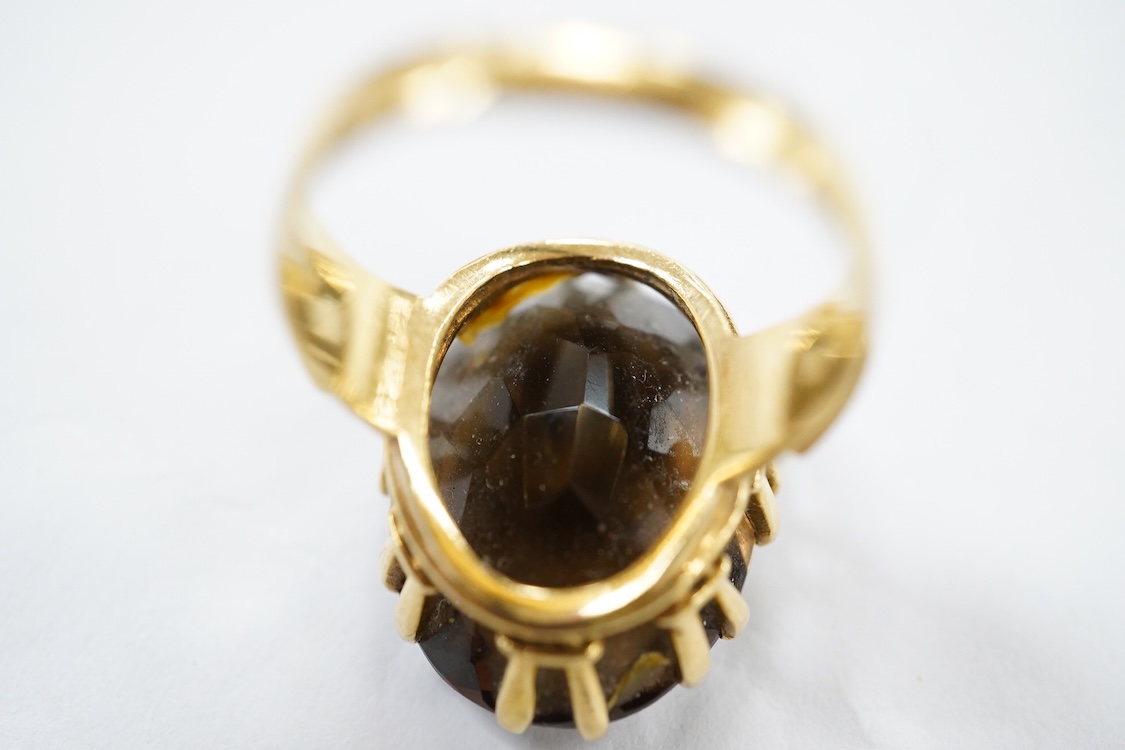 A yellow metal stick pin, the terminal modelled as a Knight's arm holding a scroll(a.f.), 79mm, together with two pairs of yellow metal and gem set ear clips including 9ct and opal doublet.
